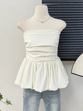 Women's elastic pleated puff strapless top.